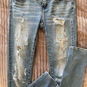 Buckle Blue Skinny Jeans with Distressed Details
